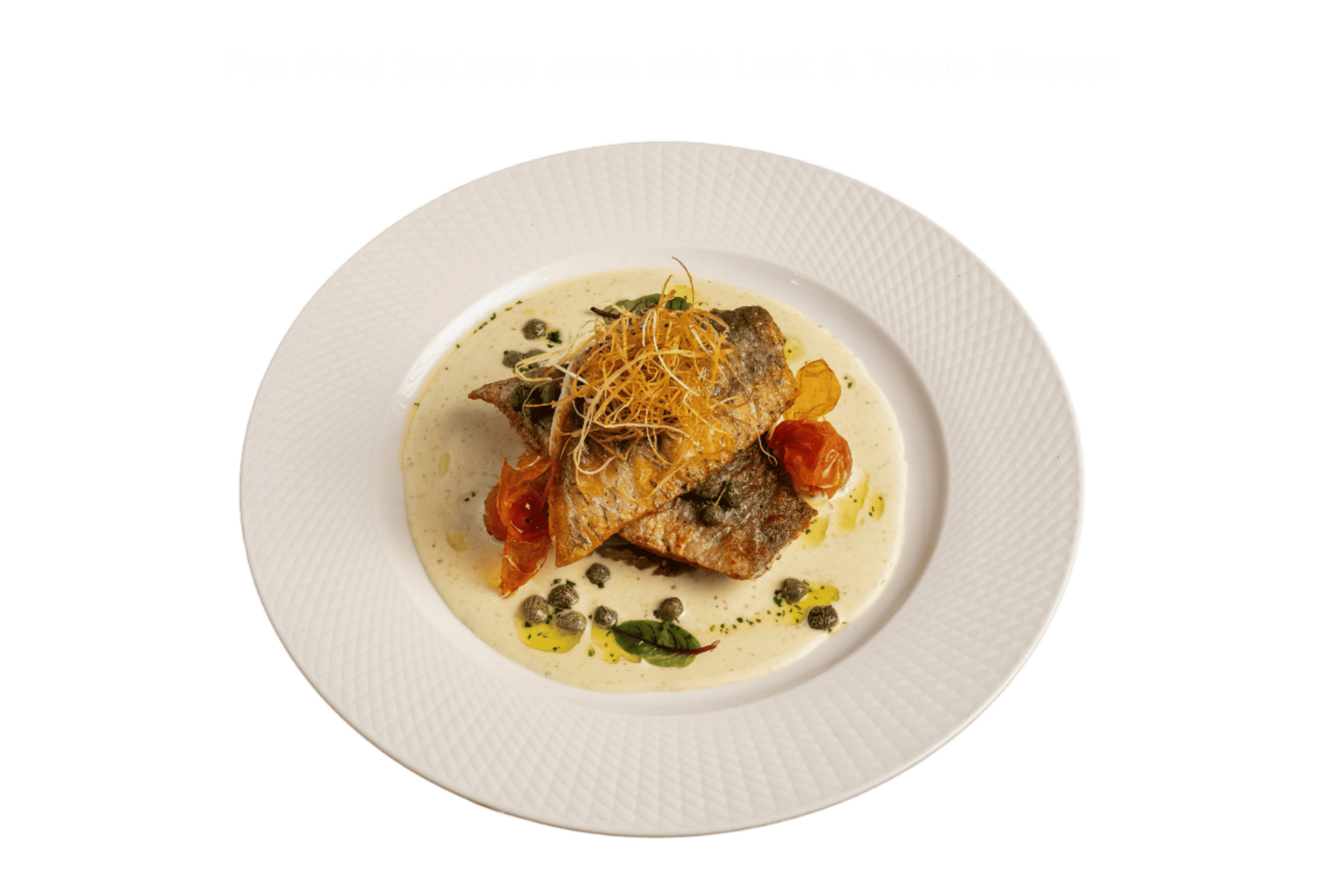 Crispy pan-fried seabass served on creamy leek and potato mousse with cherry tomatoes – gourmet seafood dish at Davin Cafe