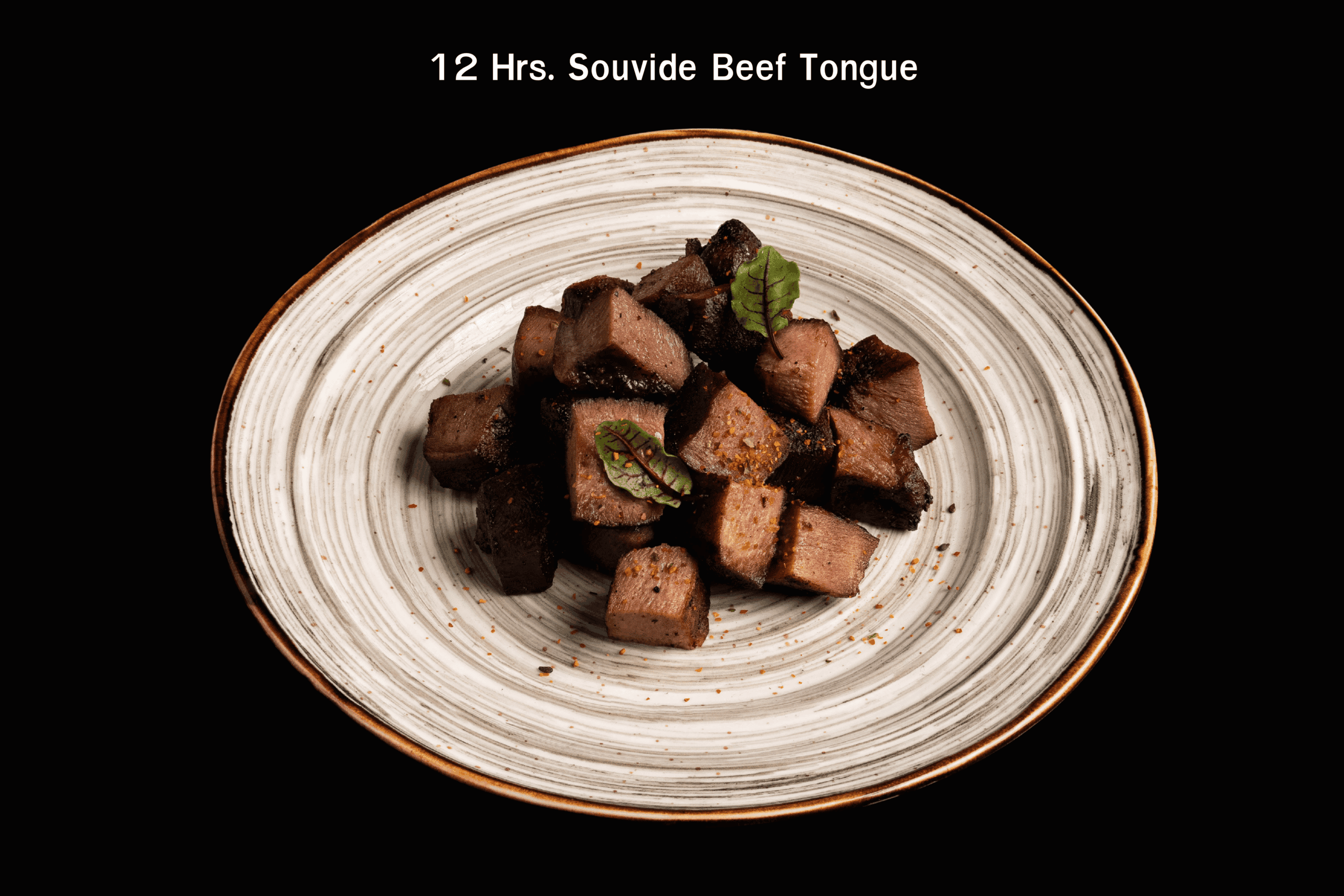 12-hour sous vide beef tongue cubes served on a ceramic plate at Davin Cafe