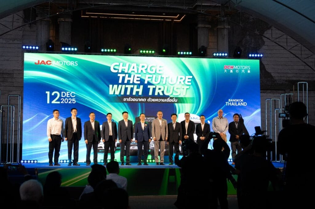 Executives and company representatives on stage during a corporate party and business event, reflecting a formal company announcement, brand communication, and a professional corporate gathering environment.