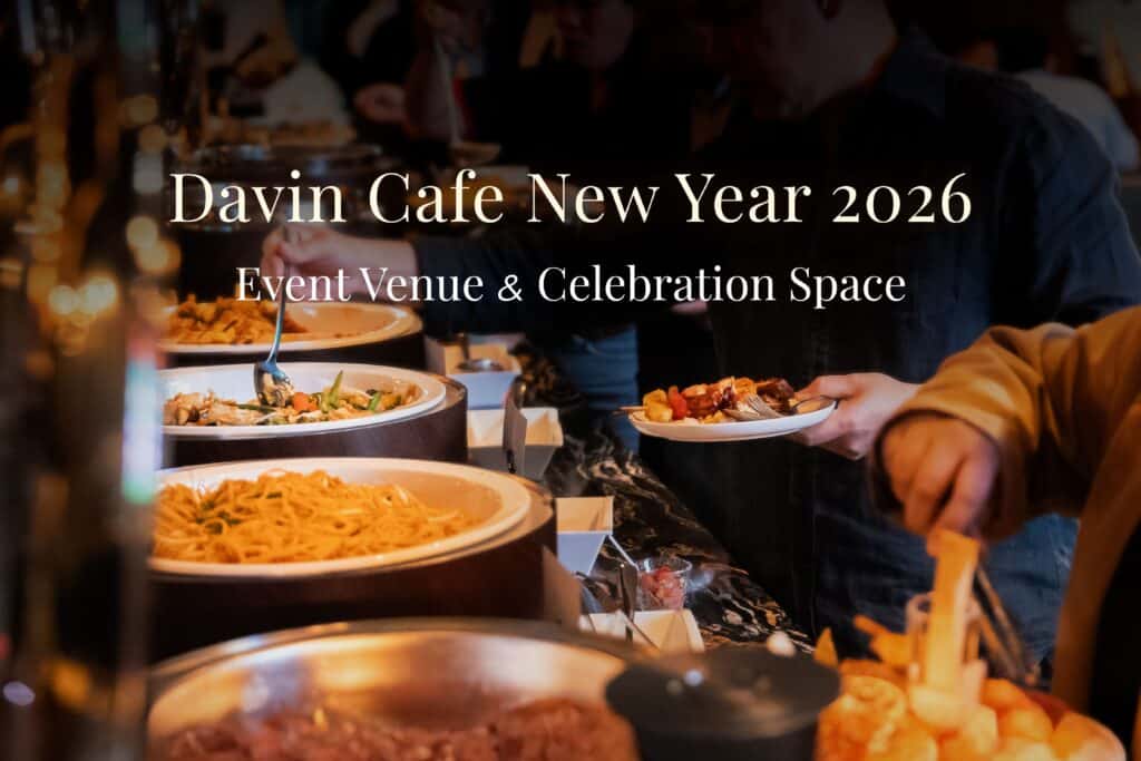 Guests enjoying a buffet dinner inside a New Year event venue, highlighting a well-planned celebration space with curated food service, ideal for corporate year-end parties and premium New Year gatherings that focus on shared dining experiences
