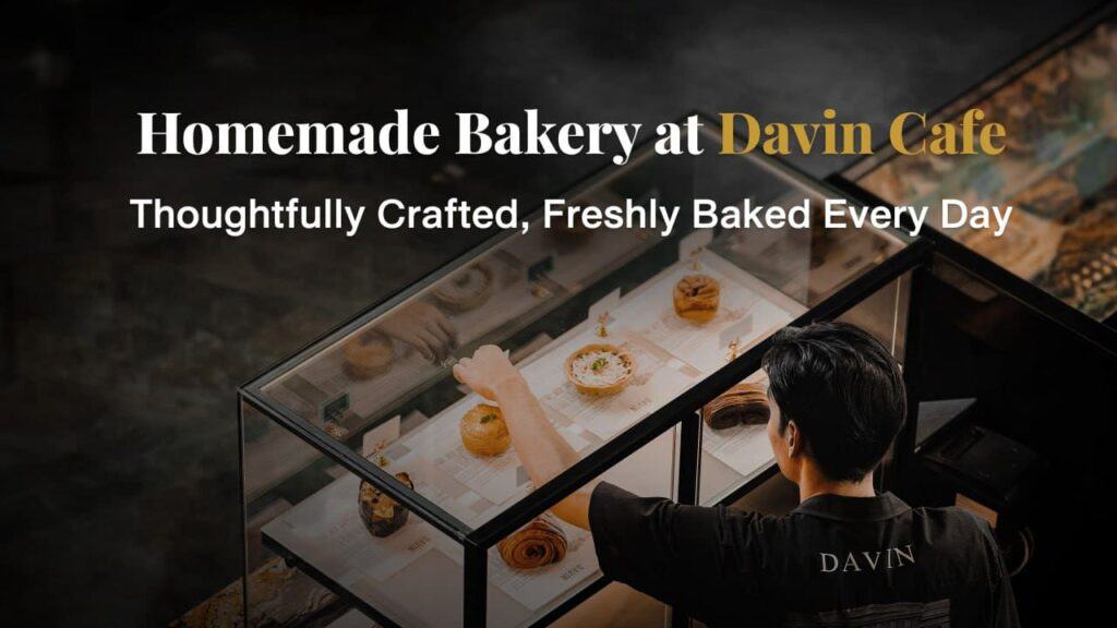 Artisan bakery menu with premium ingredients, freshly baked daily and displayed in a real café pastry showcase