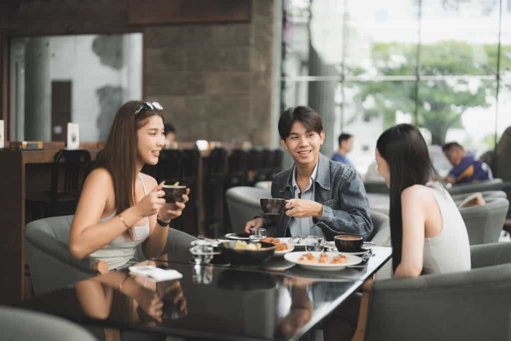 Near me café in Ramintra at Davin Cafe, a relaxed lifestyle café where friends enjoy coffee, food, and comfortable social time