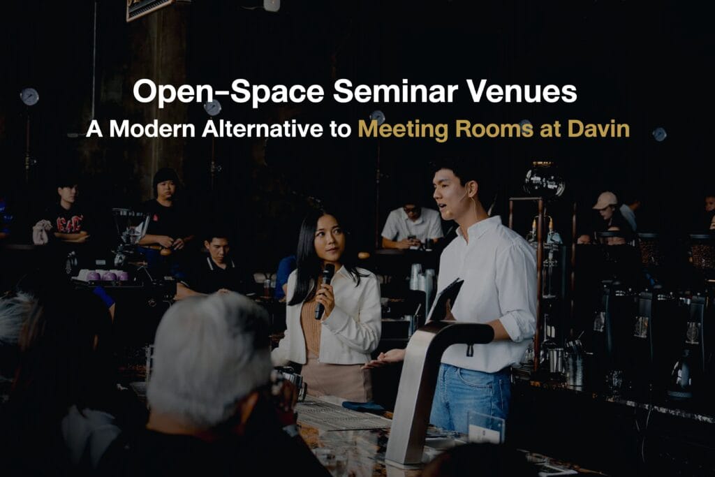 An open-space seminar setup at Davin Cafe in Ramintra, where speakers and participants interact in a relaxed cafe environment, presenting ideas in a modern seminar venue designed beyond traditional meeting rooms.