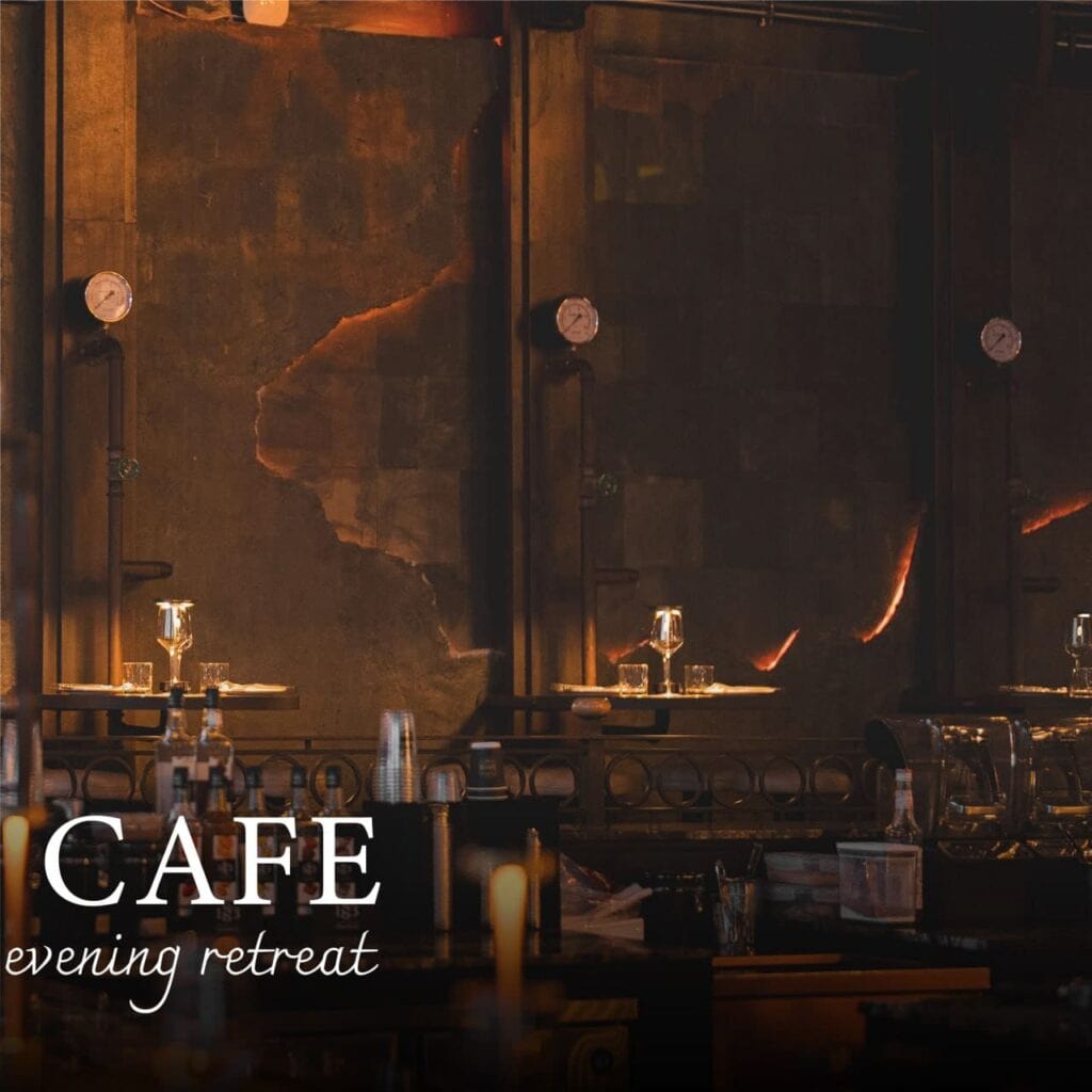 Warm evening interior at Davin Cafe featuring industrial textures, candlelight tables and a curated bar setting—capturing the refined atmosphere of a leading bakery Bangkok venue where artisanal pastries meet an intimate dining experience.