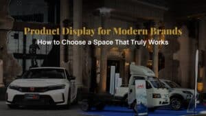 An industrial-style event venue at Davin Cafe designed for product display, featuring an open-layout structure, dramatic lighting, and sculptural elements that enhance brand presentation and create an immersive showcase experience for premium products.