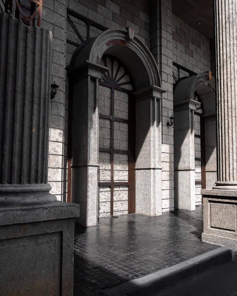 Architectural detail of Davin Cafe in Bangkok featuring classic European-style stone arches and columns, highlighting the distinctive design of a visually striking coffee shop destination.
