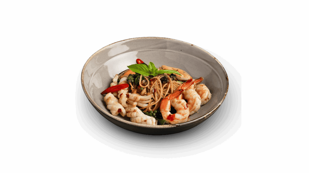 เมนู SPICY MIXED SEAFOOD จาก DAVIN CAFE ร้านอาหารในกรุงเทพ พาสต้าอาหารทะเลรสเผ็ดจัดจ้าน เสิร์ฟพร้อมกุ้ง ปลาหมึก และสมุนไพรสด ให้รสชาติกลมกล่อมสไตล์ฟิวชัน เหมาะสำหรับคนที่มองหาร้านอาหารในกรุงเทพที่มีเมนูซีฟู้ดพรีเมียม