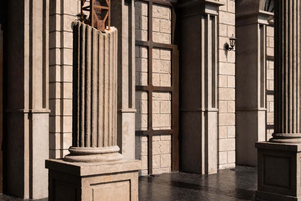 Close-up of stone columns and textured walls at Davin Cafe, highlighting refined European-inspired architectural details that create a premium and design-focused café atmosphere