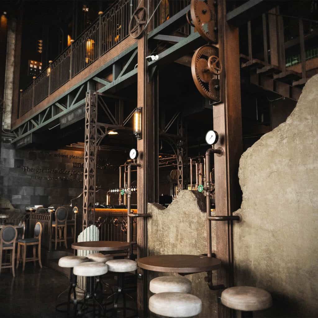 Industrial loft-style seating area at DAVIN CAFE, a distinctive liap duan cafe in Bangkok, featuring raw steel structures, vintage details, and a unique ambiance for relaxed coffee breaks and creative photography