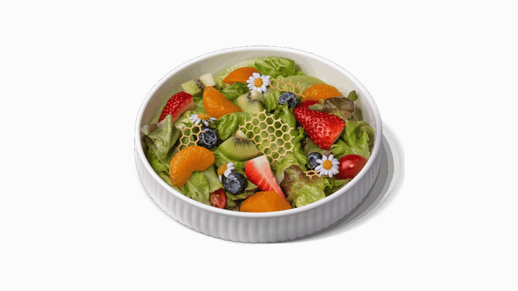 DAVIN IN THE GARDEN at DAVIN CAFE restaurant Bangkok featuring a vibrant fresh salad with mixed greens, strawberries, kiwi, blueberries, citrus and edible flowers, a healthy and refreshing signature salad in Bangkok restaurant scene for wellness food lovers