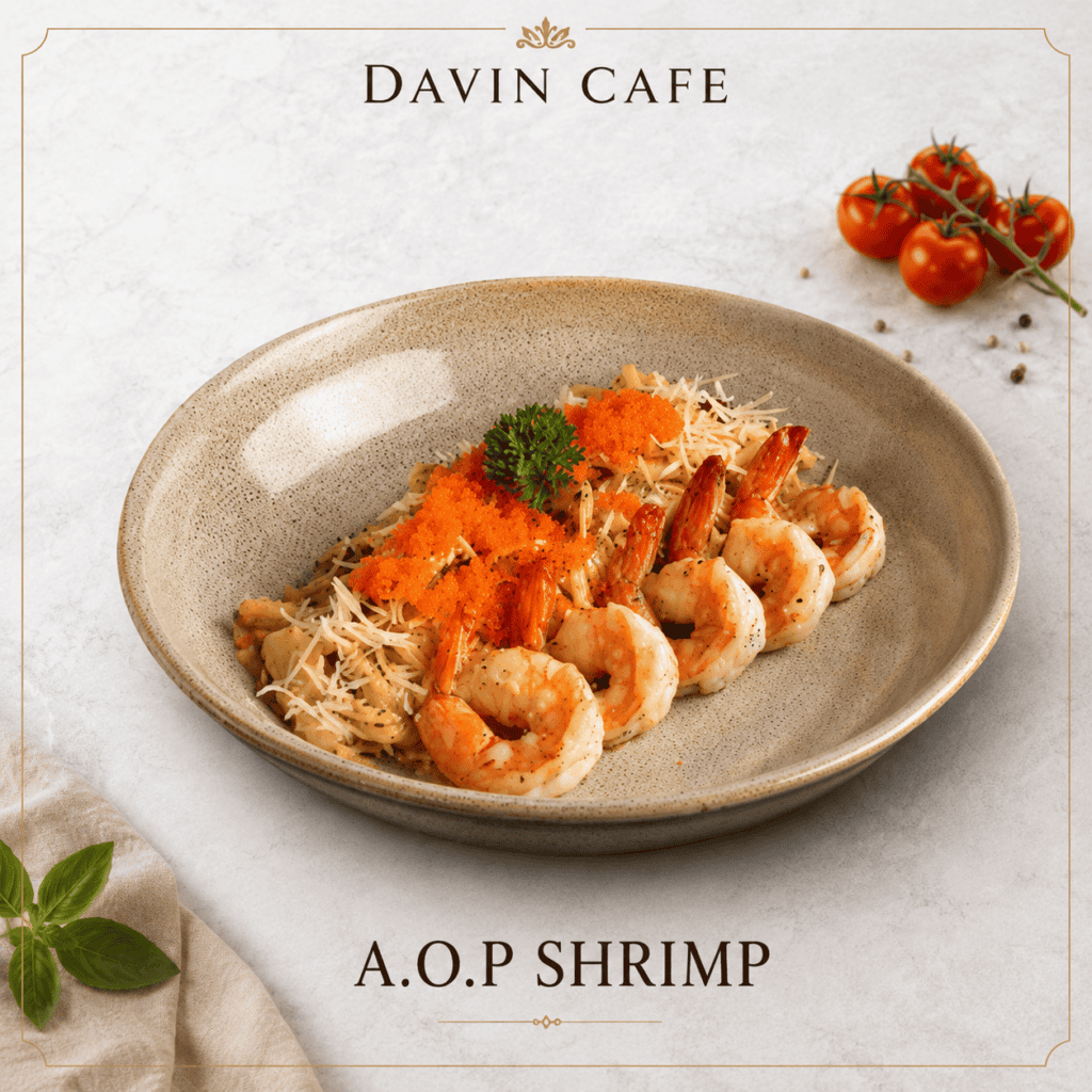 A.O.P shrimp pasta at Davin Cafe, served with plump shrimp, tobiko, cheese, and fresh garnish in a refined ceramic bowl for a flavorful lunch option with quality ingredients and a premium cafe dining feel.
