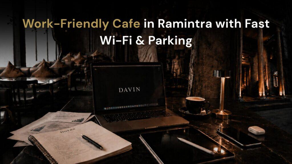 Hero image for Davin Cafe as a work-friendly cafe in Ramintra, featuring a laptop workspace, coffee, notebook, and warm interior atmosphere for guests looking for Wi-Fi, parking, and a calm place to work in Bangkok.