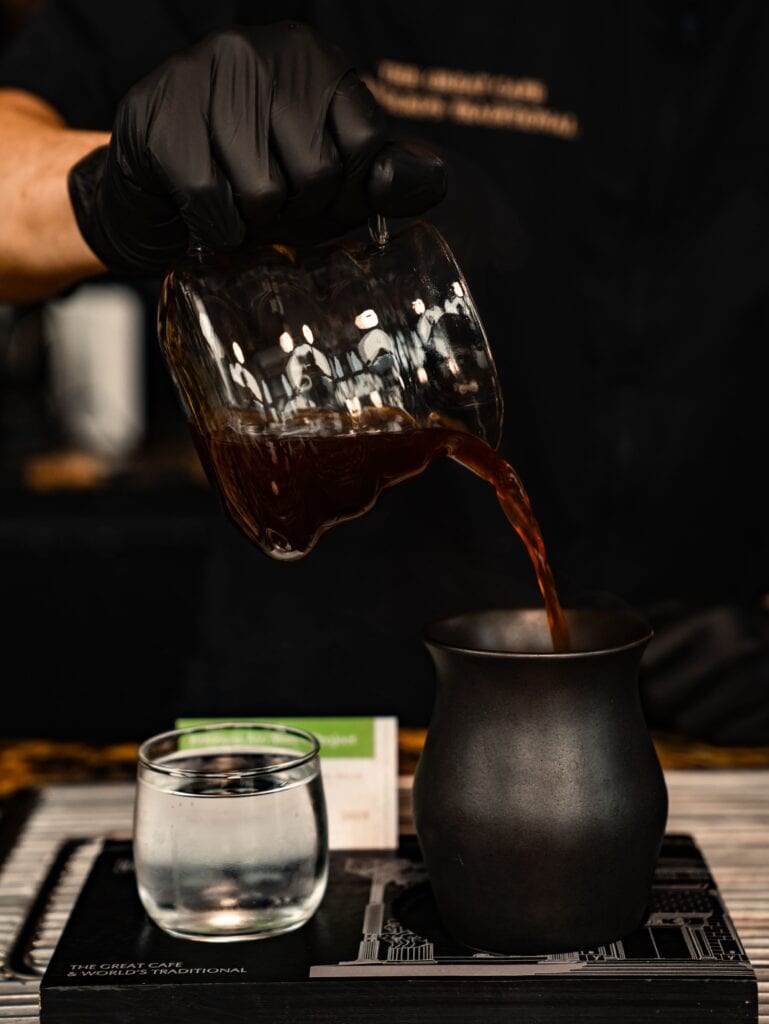 Hand-poured Panama Geisha drip coffee served at DAVIN CAFE, showcasing a carefully prepared specialty coffee experience
