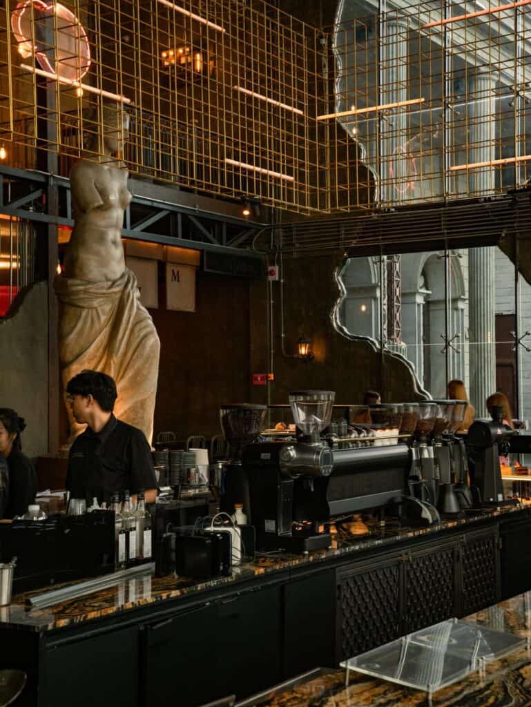 DAVIN CAFE interior, a European-style cafe in Bangkok with a classic coffee bar and distinctive interior design