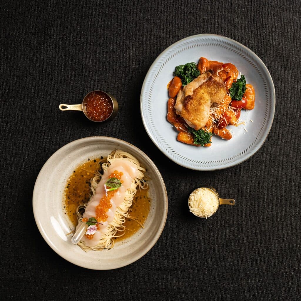Italian restaurant lunch at DAVIN CAFE featuring pasta and a plated main course in Bangkok